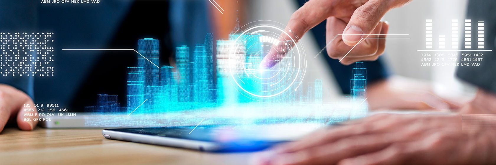 En hand pekar på en digital modell av en byggnad