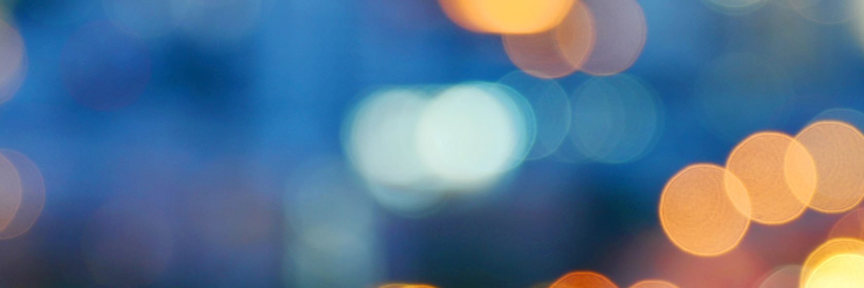 Blå suddig bakgrund med suddiga ljus