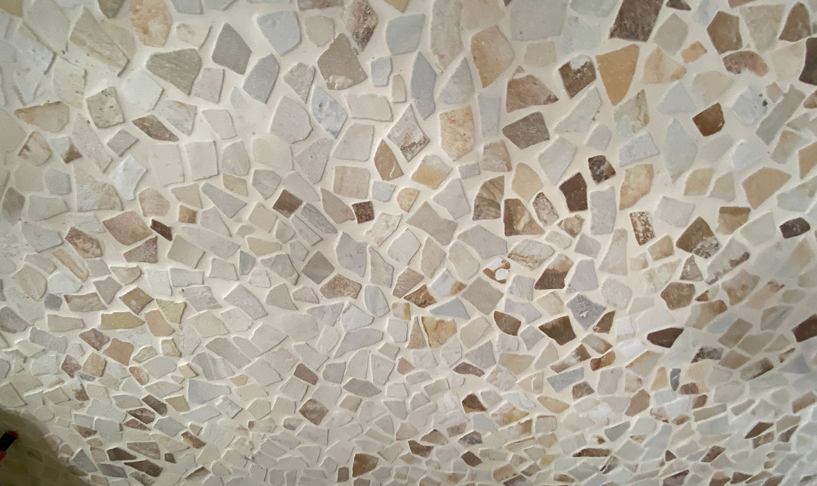 Mosaikgolv i beige toner