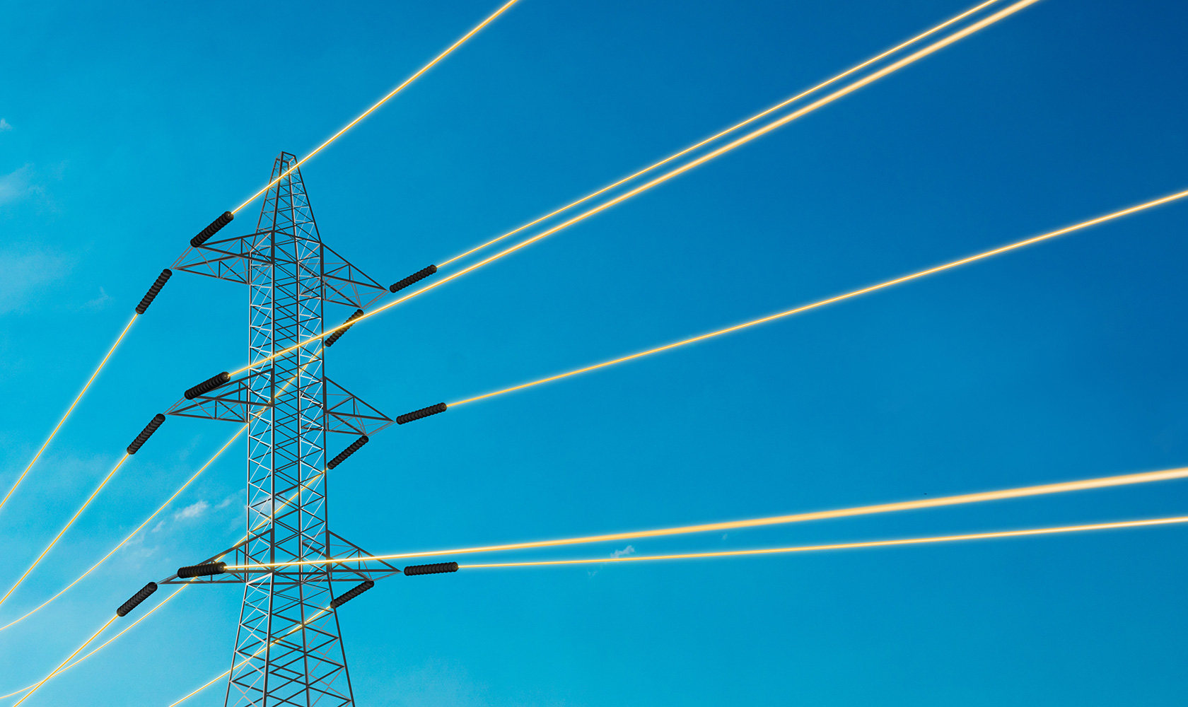 Elnät mot blå himmel