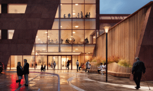 Visionsskiss av Kiruna nya sjukhus. Genom en glasfasad i kvällsbelysning syns människor på olika våningar.