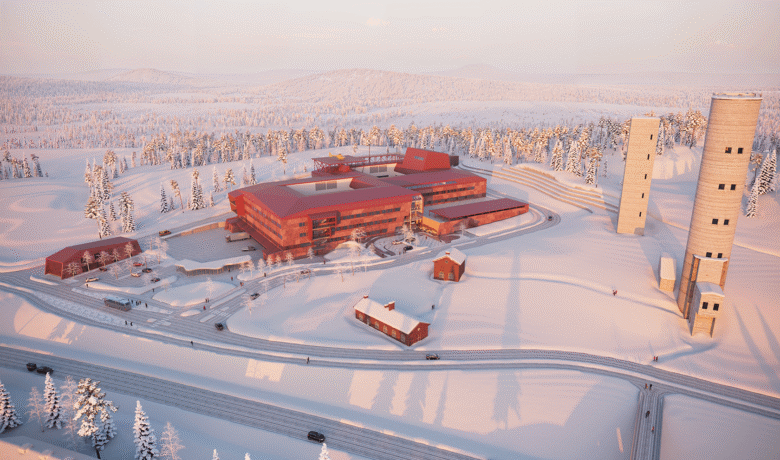 Visionskiss över sjukhusområdet för Kiruna nya sjukhus. Röda byggnader i ett snötäckt landskap.